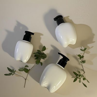 100-250 مل زجاجة بلاستيكية على شكل أسنان مع مضخة للضغط لغسل اليدين مستحضر الشعر مطهر اليدين الشعار القابل للتخصيص