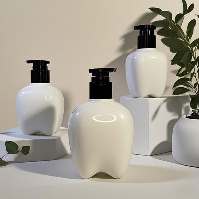 100-250 مل زجاجة بلاستيكية على شكل أسنان مع مضخة للضغط لغسل اليدين مستحضر الشعر مطهر اليدين الشعار القابل للتخصيص